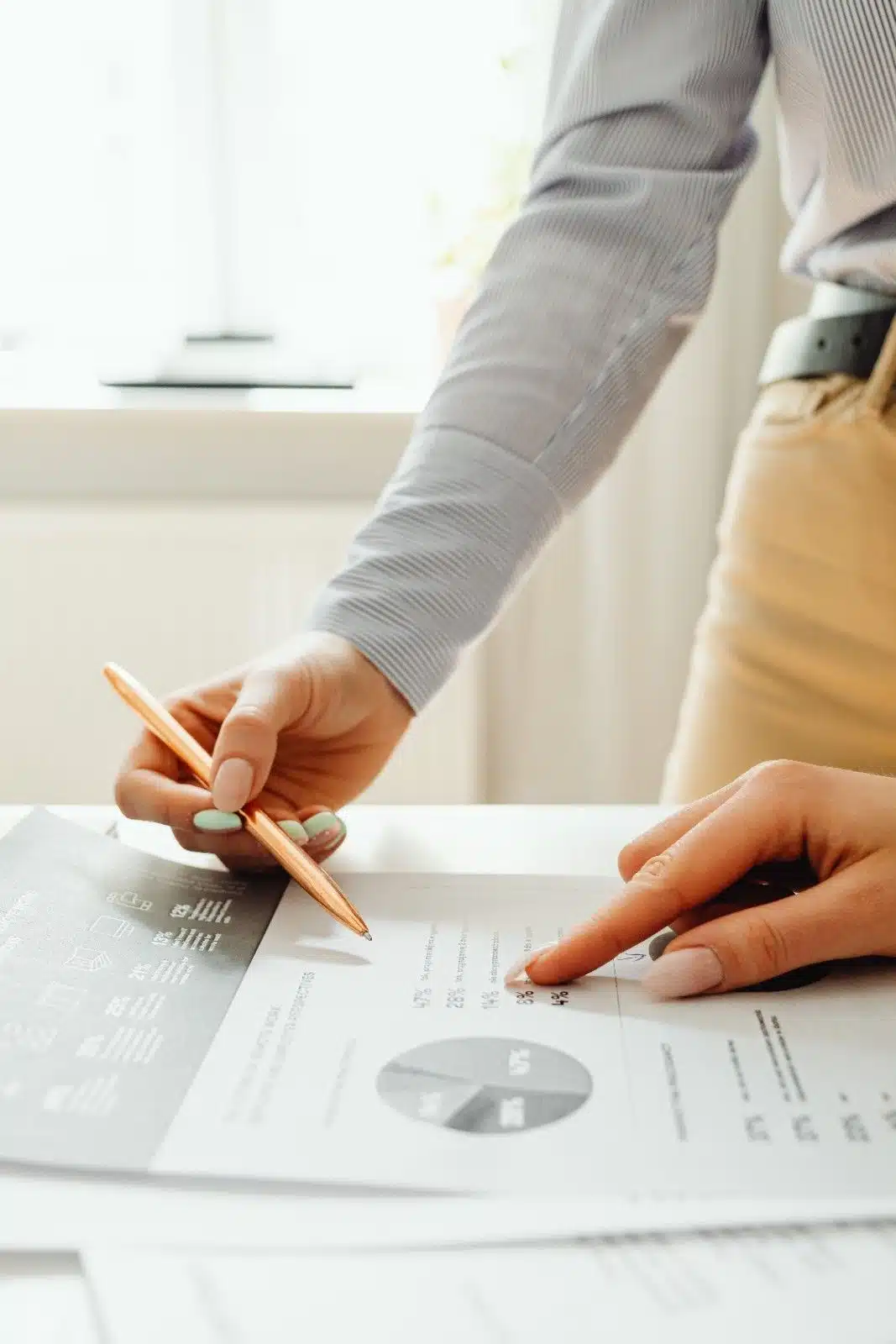 Investor signing property purchase paperwork