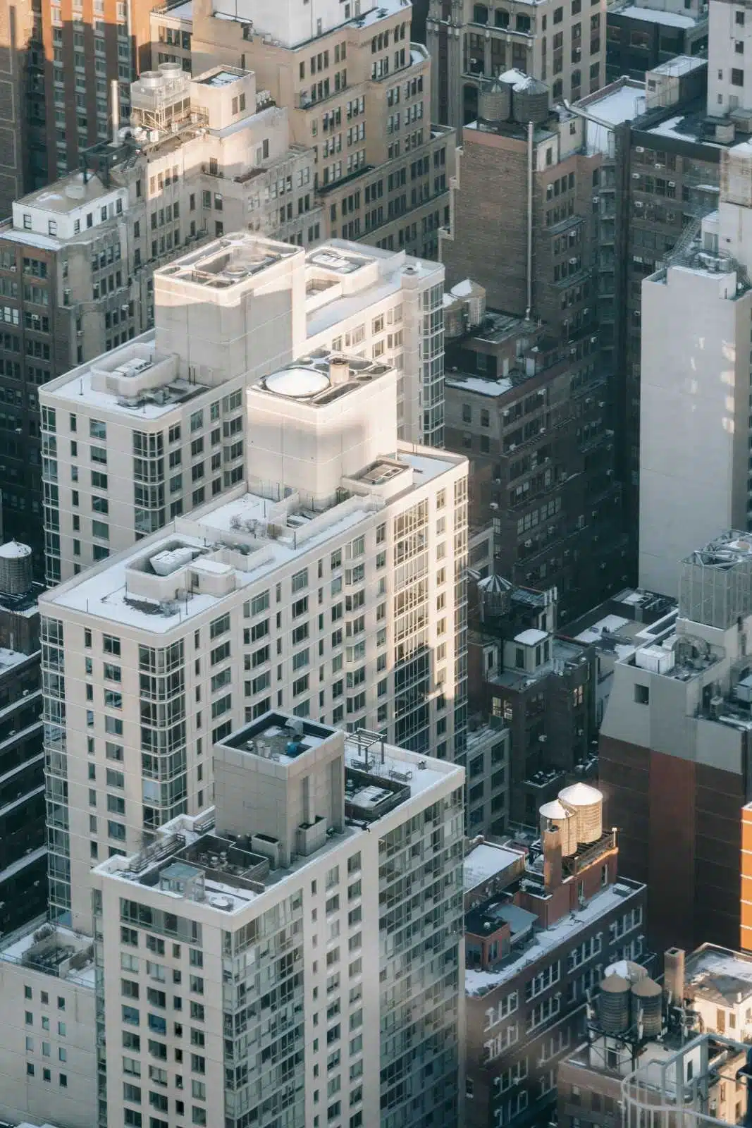 Investor reviewing commercial real estate investment documents at a desk